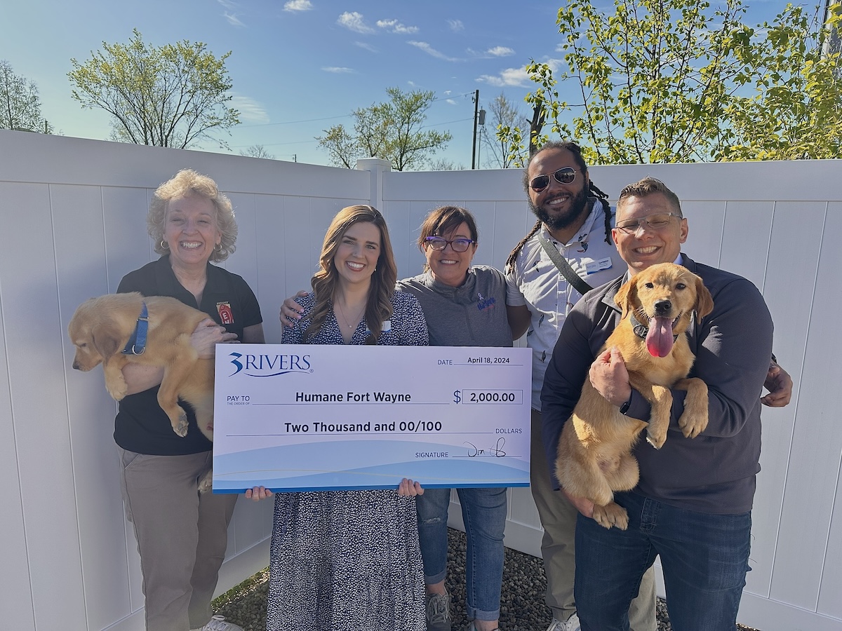 3Rivers team members pose with Humane Fort Wayne after donating to The Mighty Match Up fundraiser