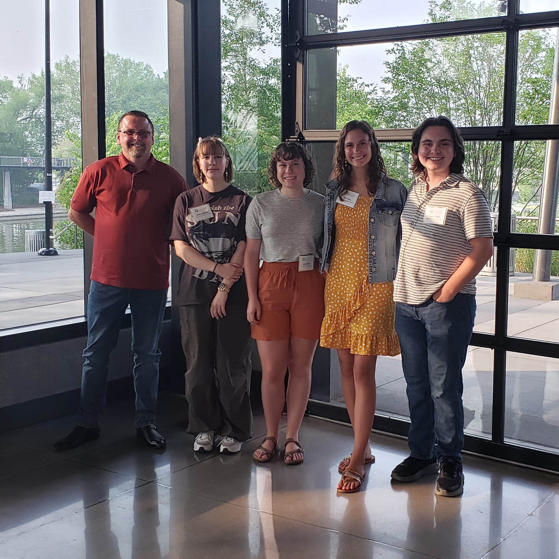 A group of Questa Scholars poses for a photo