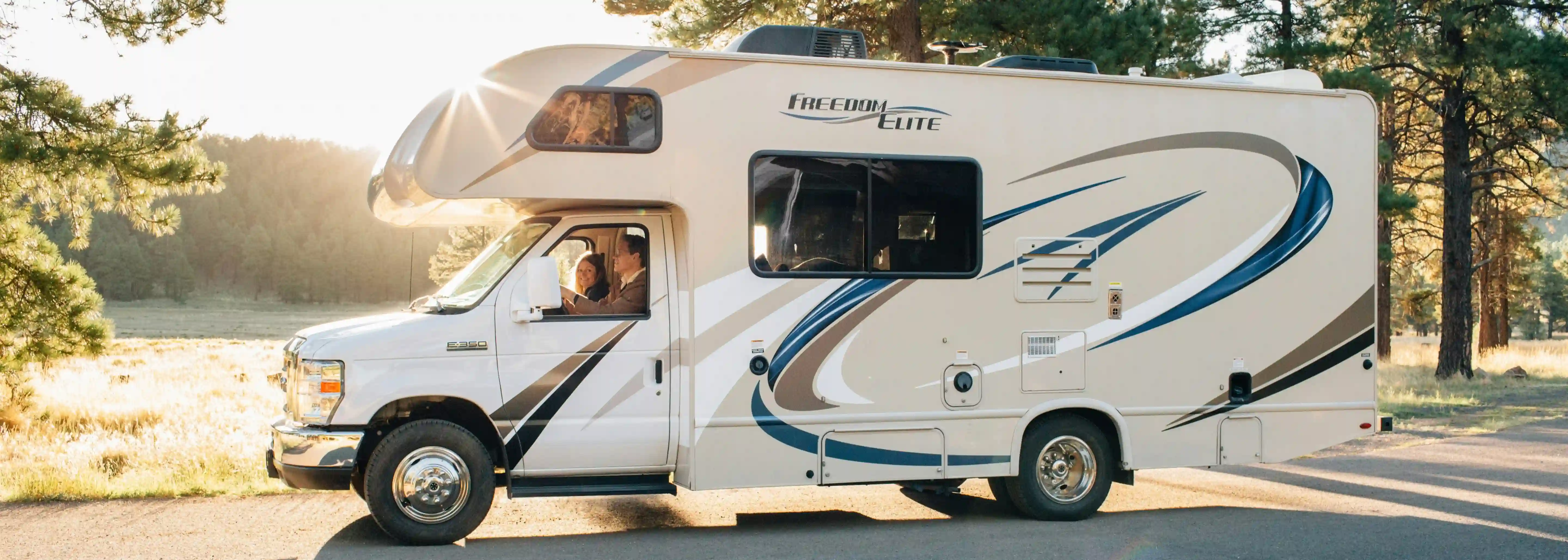 A person driving a camper