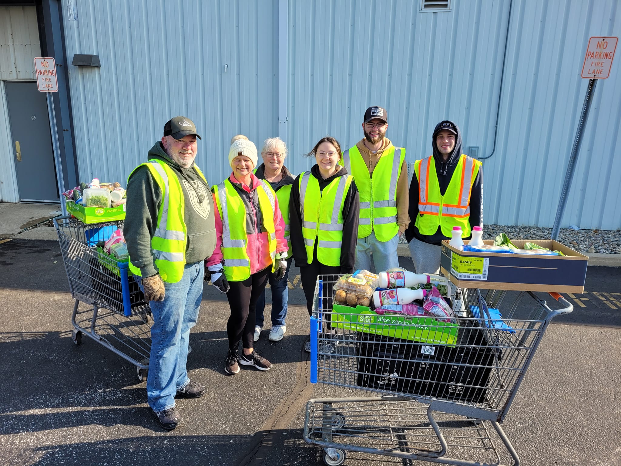 Volunteers outside of Community Harvest Food Bank